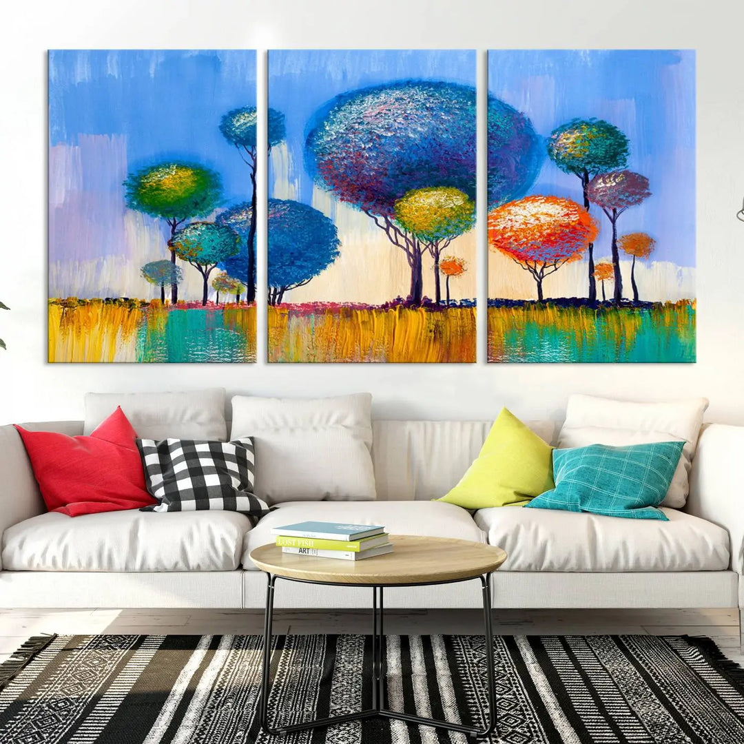 The vibrant "Oil Paint Effect Colorful Trees Wall Art Canvas Print," with its abstract depiction of round-topped trees on a blue background, is printed on museum-quality canvas and includes a UV-protective coating to maintain its bright colors.