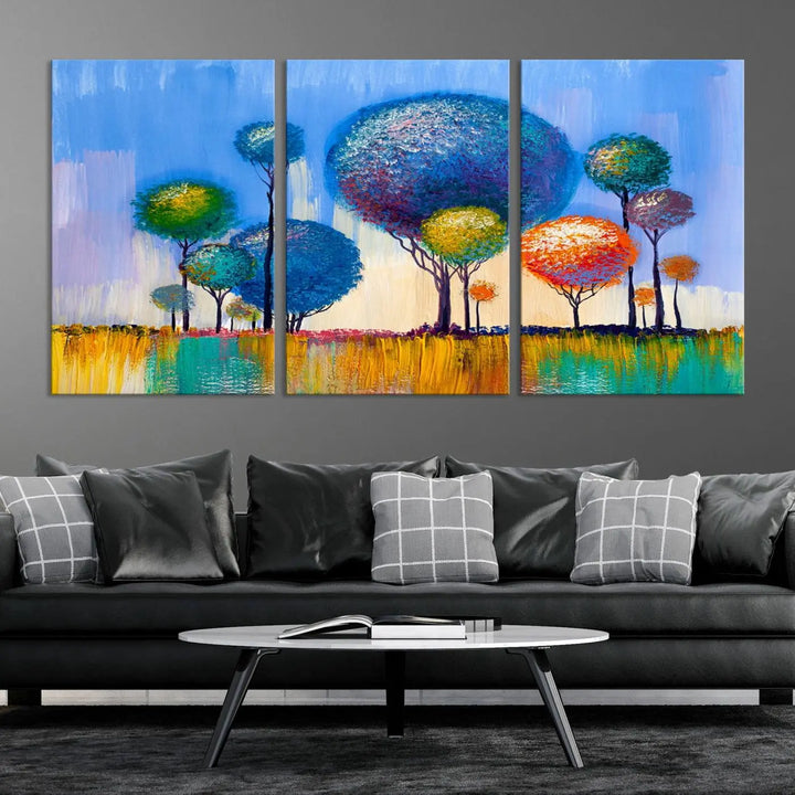 The vibrant "Oil Paint Effect Colorful Trees Wall Art Canvas Print," with its abstract depiction of round-topped trees on a blue background, is printed on museum-quality canvas and includes a UV-protective coating to maintain its bright colors.