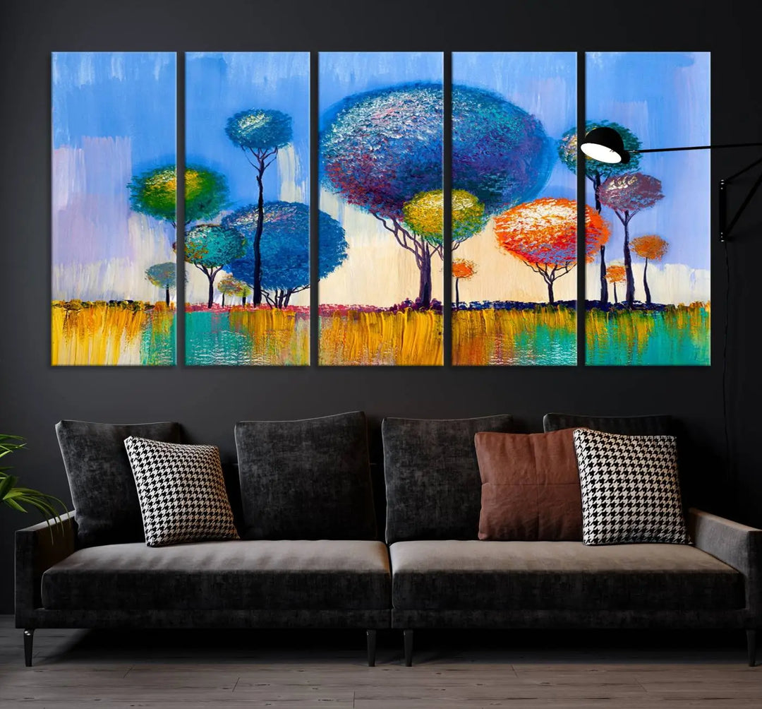 The vibrant "Oil Paint Effect Colorful Trees Wall Art Canvas Print," with its abstract depiction of round-topped trees on a blue background, is printed on museum-quality canvas and includes a UV-protective coating to maintain its bright colors.