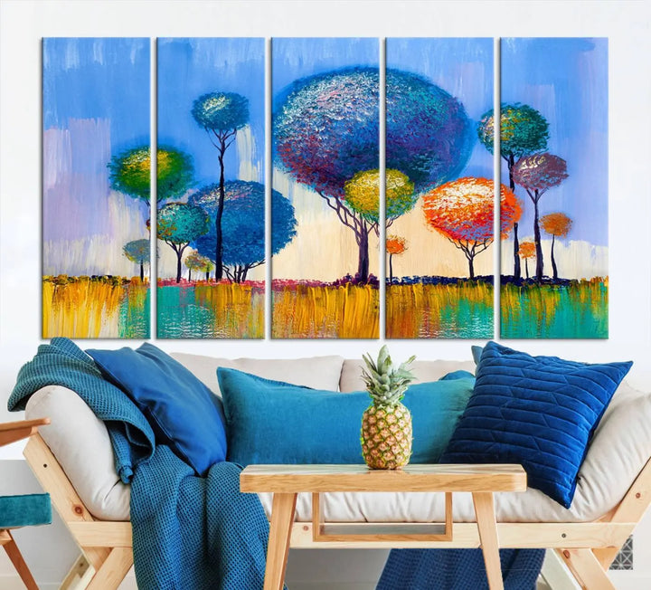 The vibrant "Oil Paint Effect Colorful Trees Wall Art Canvas Print," with its abstract depiction of round-topped trees on a blue background, is printed on museum-quality canvas and includes a UV-protective coating to maintain its bright colors.