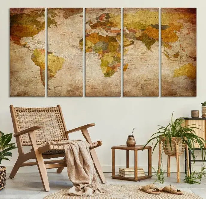 The Old Antique World Map Wall Art Canvas Print, featuring a three-panel vintage design and crafted with museum-quality canvas and UV-protective coating, hangs elegantly against a dark wall.