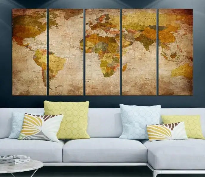 The Old Antique World Map Wall Art Canvas Print, featuring a three-panel vintage design and crafted with museum-quality canvas and UV-protective coating, hangs elegantly against a dark wall.