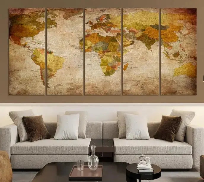 The Old Antique World Map Wall Art Canvas Print, featuring a three-panel vintage design and crafted with museum-quality canvas and UV-protective coating, hangs elegantly against a dark wall.