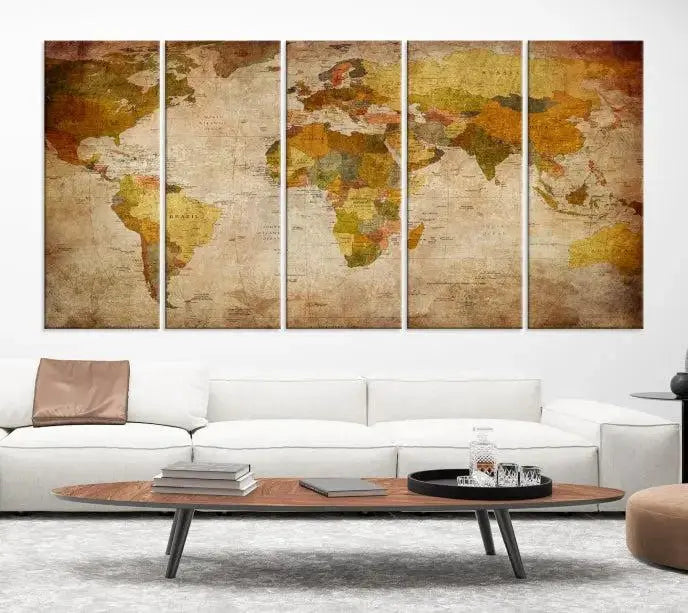 The Old Antique World Map Wall Art Canvas Print, featuring a three-panel vintage design and crafted with museum-quality canvas and UV-protective coating, hangs elegantly against a dark wall.