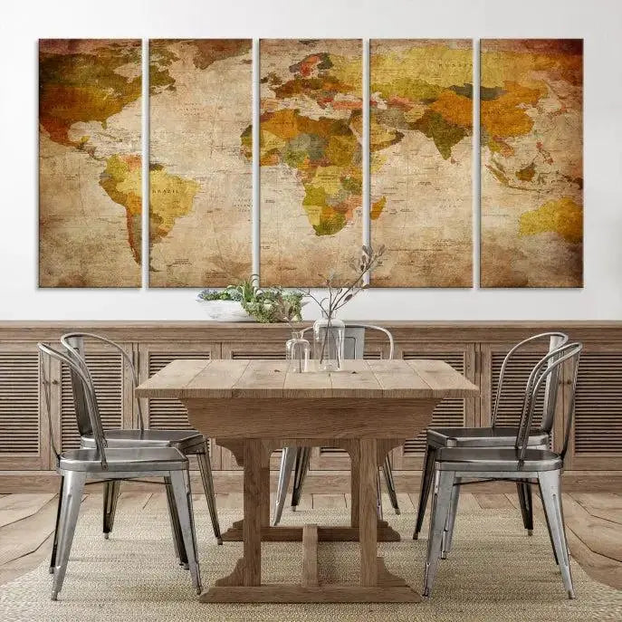 The Old Antique World Map Wall Art Canvas Print, featuring a three-panel vintage design and crafted with museum-quality canvas and UV-protective coating, hangs elegantly against a dark wall.