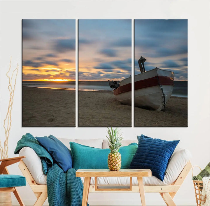 This living room showcases the "Old Boat On The Beach Sunset Coastal Ocean Wall Art Canvas," a three-panel artwork crafted on museum-quality canvas. This ready-to-hang piece is finished with a UV-protective coating for enduring beauty.