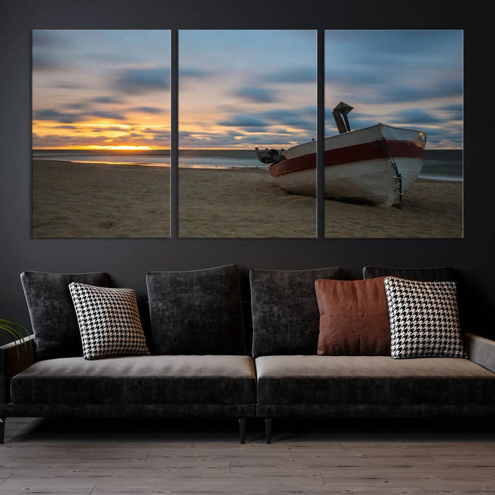 This living room showcases the "Old Boat On The Beach Sunset Coastal Ocean Wall Art Canvas," a three-panel artwork crafted on museum-quality canvas. This ready-to-hang piece is finished with a UV-protective coating for enduring beauty.