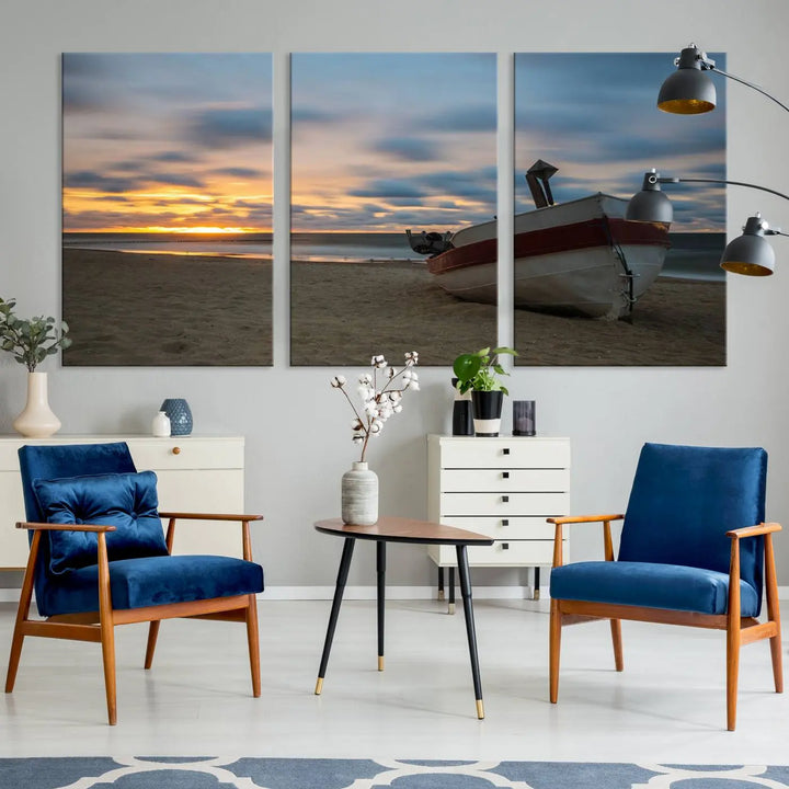 This living room showcases the "Old Boat On The Beach Sunset Coastal Ocean Wall Art Canvas," a three-panel artwork crafted on museum-quality canvas. This ready-to-hang piece is finished with a UV-protective coating for enduring beauty.