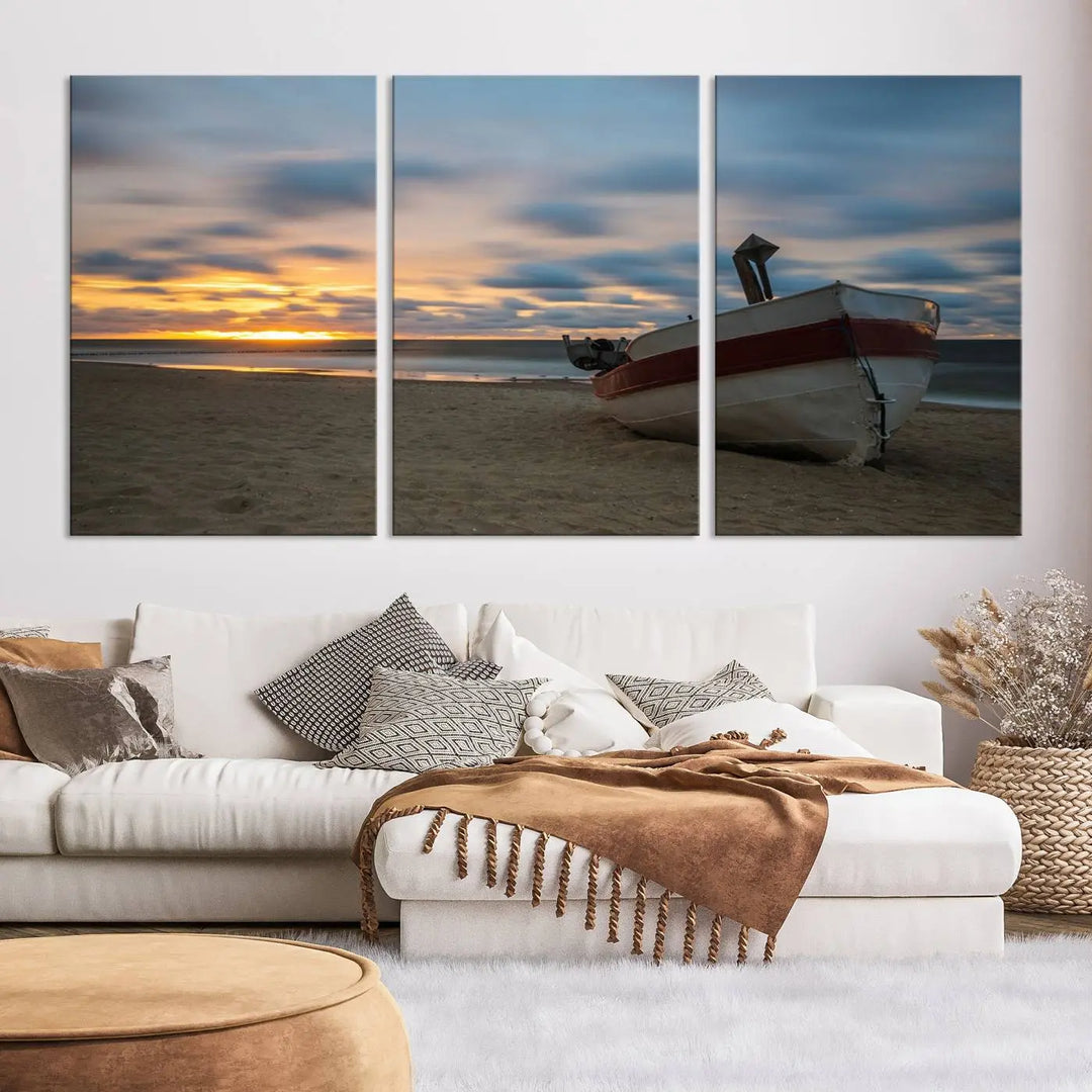 This living room showcases the "Old Boat On The Beach Sunset Coastal Ocean Wall Art Canvas," a three-panel artwork crafted on museum-quality canvas. This ready-to-hang piece is finished with a UV-protective coating for enduring beauty.