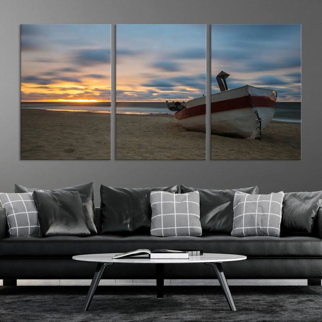 This living room showcases the "Old Boat On The Beach Sunset Coastal Ocean Wall Art Canvas," a three-panel artwork crafted on museum-quality canvas. This ready-to-hang piece is finished with a UV-protective coating for enduring beauty.