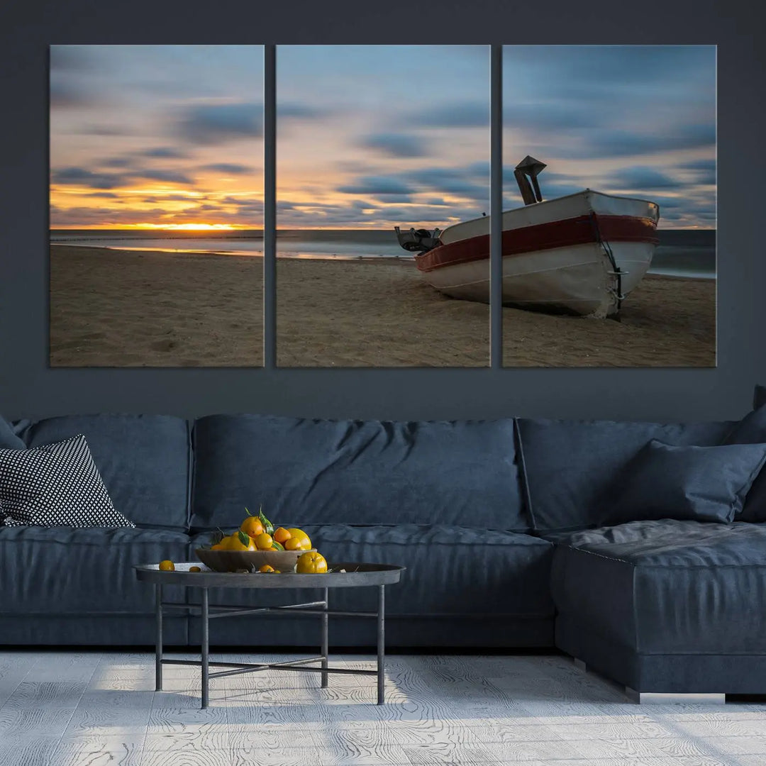 This living room showcases the "Old Boat On The Beach Sunset Coastal Ocean Wall Art Canvas," a three-panel artwork crafted on museum-quality canvas. This ready-to-hang piece is finished with a UV-protective coating for enduring beauty.