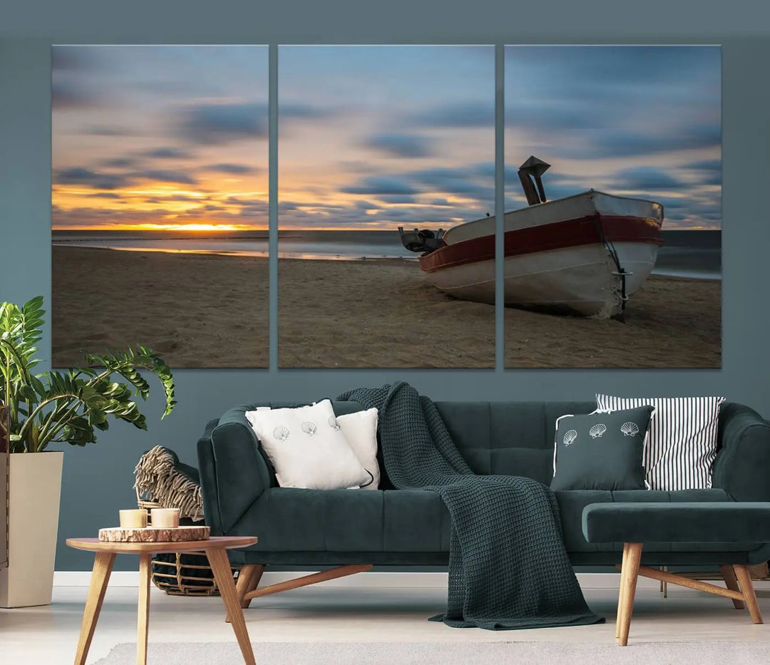 This living room showcases the "Old Boat On The Beach Sunset Coastal Ocean Wall Art Canvas," a three-panel artwork crafted on museum-quality canvas. This ready-to-hang piece is finished with a UV-protective coating for enduring beauty.