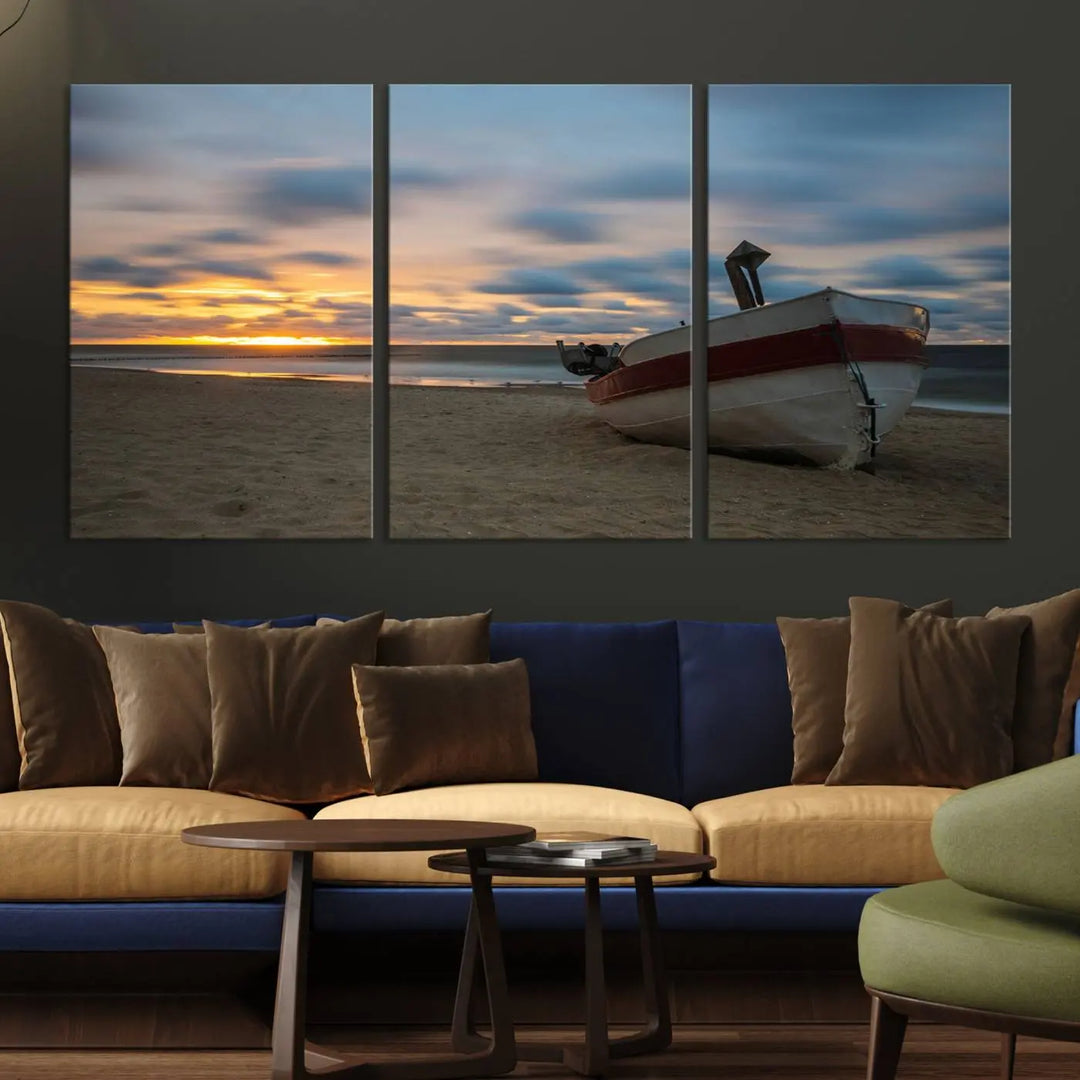 This living room showcases the "Old Boat On The Beach Sunset Coastal Ocean Wall Art Canvas," a three-panel artwork crafted on museum-quality canvas. This ready-to-hang piece is finished with a UV-protective coating for enduring beauty.