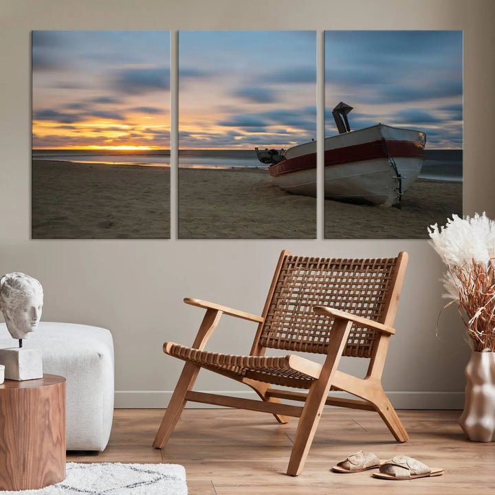 This living room showcases the "Old Boat On The Beach Sunset Coastal Ocean Wall Art Canvas," a three-panel artwork crafted on museum-quality canvas. This ready-to-hang piece is finished with a UV-protective coating for enduring beauty.