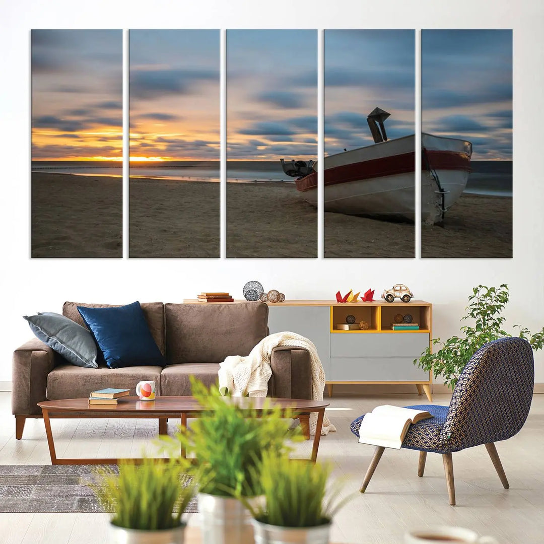 This living room showcases the "Old Boat On The Beach Sunset Coastal Ocean Wall Art Canvas," a three-panel artwork crafted on museum-quality canvas. This ready-to-hang piece is finished with a UV-protective coating for enduring beauty.