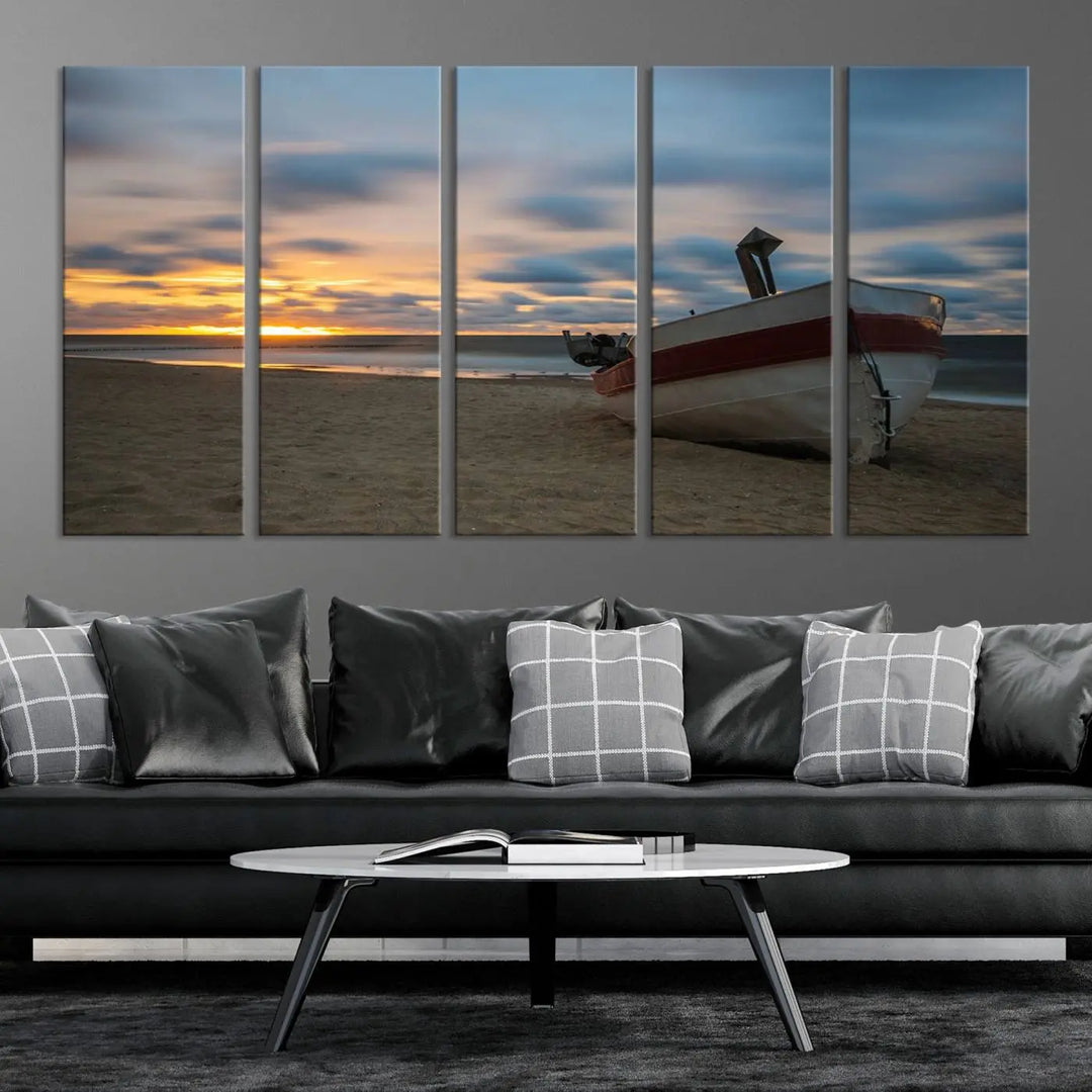 This living room showcases the "Old Boat On The Beach Sunset Coastal Ocean Wall Art Canvas," a three-panel artwork crafted on museum-quality canvas. This ready-to-hang piece is finished with a UV-protective coating for enduring beauty.