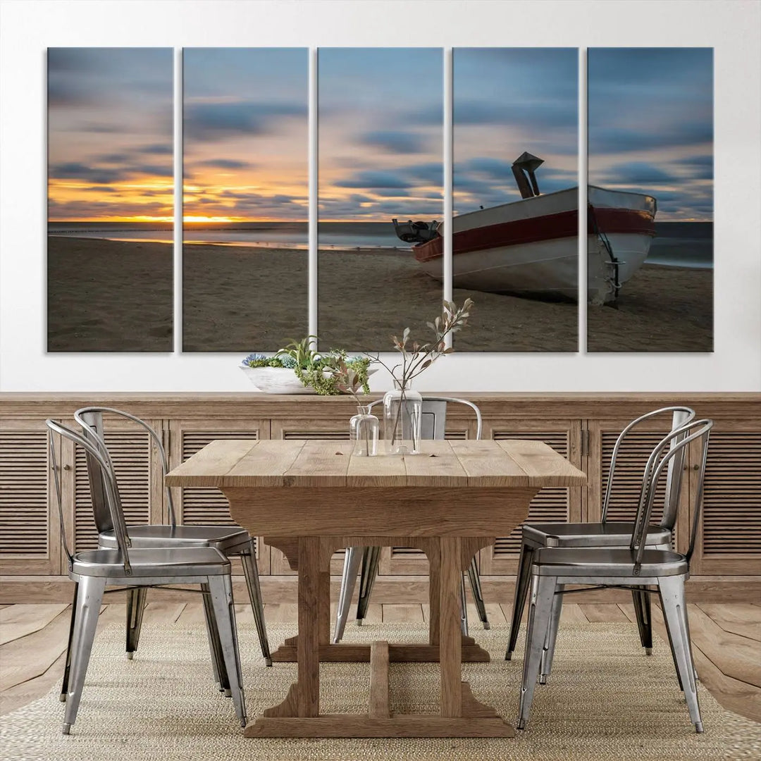 This living room showcases the "Old Boat On The Beach Sunset Coastal Ocean Wall Art Canvas," a three-panel artwork crafted on museum-quality canvas. This ready-to-hang piece is finished with a UV-protective coating for enduring beauty.