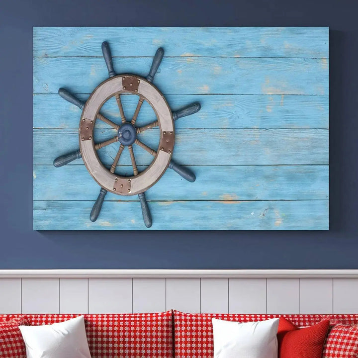 The Old Ship Steering Wheel Nautical Wall Art, printed on museum-quality canvas with a UV-protective coating, is displayed prominently on the wall.