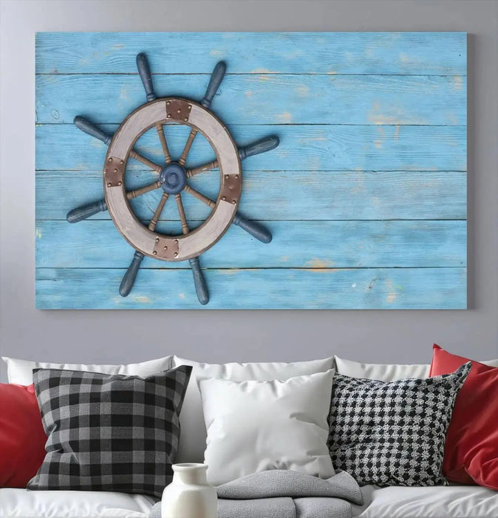 The Old Ship Steering Wheel Nautical Wall Art, printed on museum-quality canvas with a UV-protective coating, is displayed prominently on the wall.