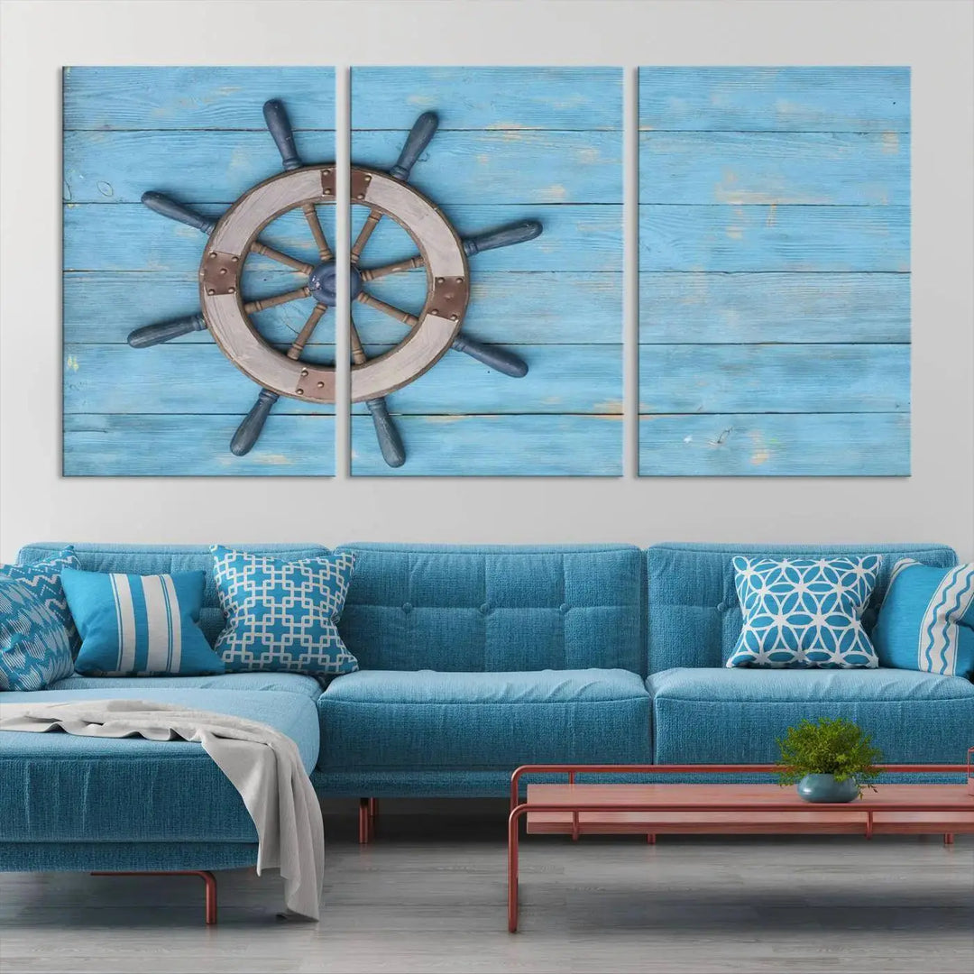 The Old Ship Steering Wheel Nautical Wall Art, printed on museum-quality canvas with a UV-protective coating, is displayed prominently on the wall.