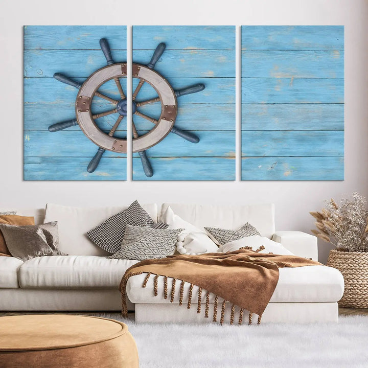 The Old Ship Steering Wheel Nautical Wall Art, printed on museum-quality canvas with a UV-protective coating, is displayed prominently on the wall.