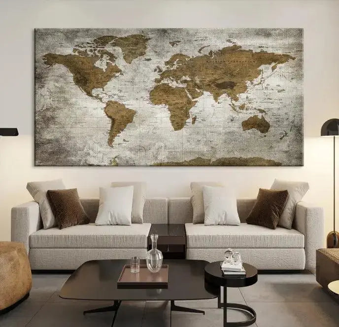 The elegant Old Style World Map Wall Art Canvas Print, presented as a stunning triptych, enhances the living room's ambiance. Crafted on museum-quality canvas and protected by a UV coating, it's ready to hang and stands as a captivating piece in the room.