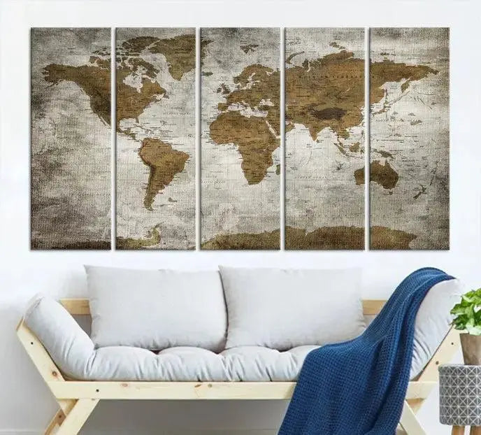 The elegant Old Style World Map Wall Art Canvas Print, presented as a stunning triptych, enhances the living room's ambiance. Crafted on museum-quality canvas and protected by a UV coating, it's ready to hang and stands as a captivating piece in the room.