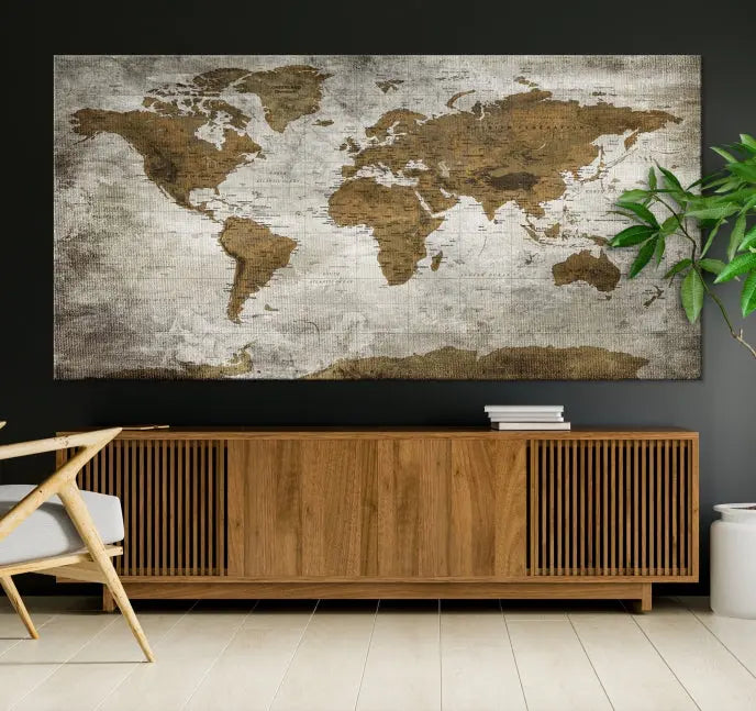 The elegant Old Style World Map Wall Art Canvas Print, presented as a stunning triptych, enhances the living room's ambiance. Crafted on museum-quality canvas and protected by a UV coating, it's ready to hang and stands as a captivating piece in the room.