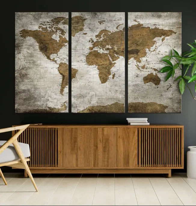 The elegant Old Style World Map Wall Art Canvas Print, presented as a stunning triptych, enhances the living room's ambiance. Crafted on museum-quality canvas and protected by a UV coating, it's ready to hang and stands as a captivating piece in the room.