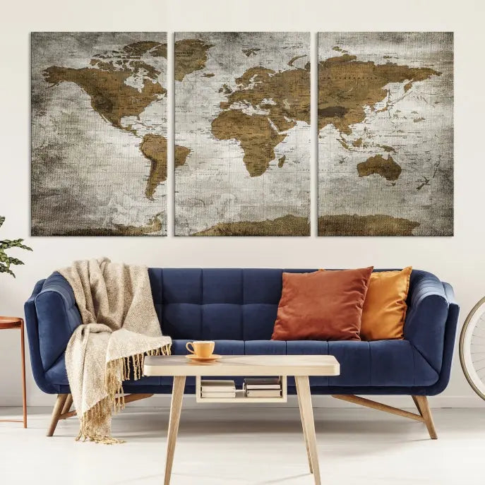 The elegant Old Style World Map Wall Art Canvas Print, presented as a stunning triptych, enhances the living room's ambiance. Crafted on museum-quality canvas and protected by a UV coating, it's ready to hang and stands as a captivating piece in the room.