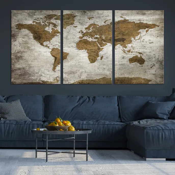 The elegant Old Style World Map Wall Art Canvas Print, presented as a stunning triptych, enhances the living room's ambiance. Crafted on museum-quality canvas and protected by a UV coating, it's ready to hang and stands as a captivating piece in the room.