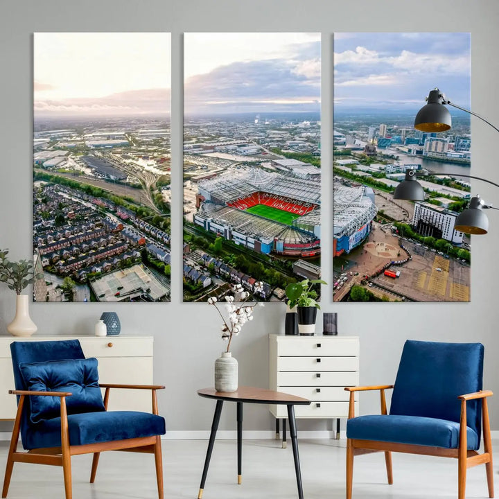 The "Old Trafford Manchester United Stadium Wall Art Canvas Print" adorns the room, showcasing an aerial view of Old Trafford at sunset. This three-panel wall art is perfect for any devoted Manchester United football fan.