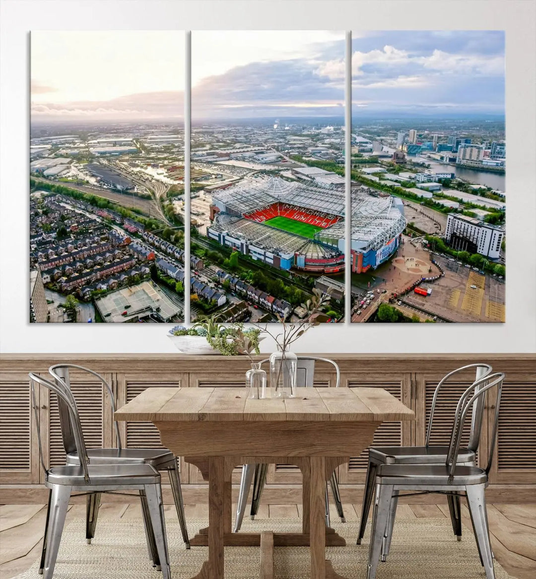 The "Old Trafford Manchester United Stadium Wall Art Canvas Print" adorns the room, showcasing an aerial view of Old Trafford at sunset. This three-panel wall art is perfect for any devoted Manchester United football fan.