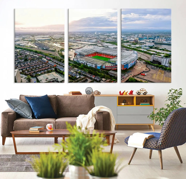 The "Old Trafford Manchester United Stadium Wall Art Canvas Print" adorns the room, showcasing an aerial view of Old Trafford at sunset. This three-panel wall art is perfect for any devoted Manchester United football fan.