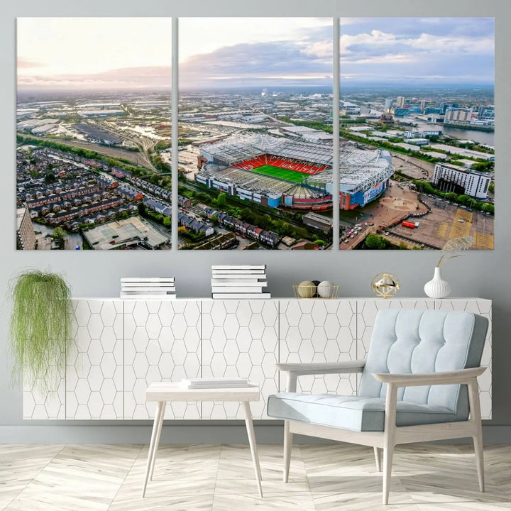 The "Old Trafford Manchester United Stadium Wall Art Canvas Print" adorns the room, showcasing an aerial view of Old Trafford at sunset. This three-panel wall art is perfect for any devoted Manchester United football fan.