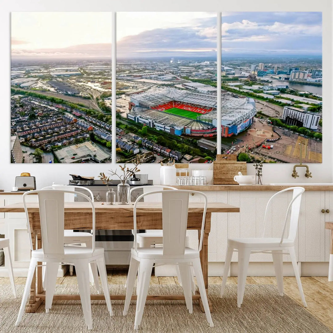 The "Old Trafford Manchester United Stadium Wall Art Canvas Print" adorns the room, showcasing an aerial view of Old Trafford at sunset. This three-panel wall art is perfect for any devoted Manchester United football fan.