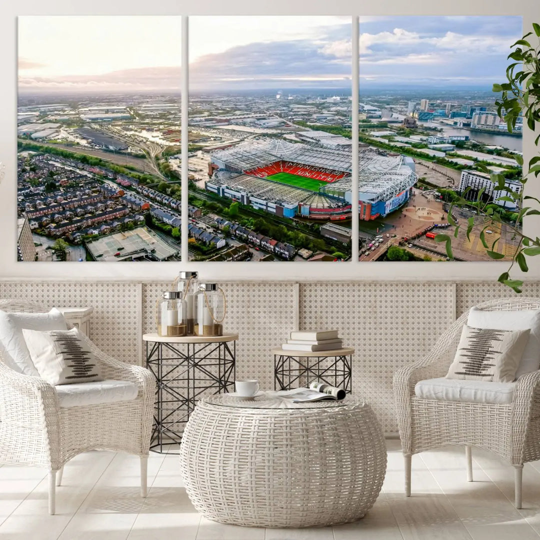 The "Old Trafford Manchester United Stadium Wall Art Canvas Print" adorns the room, showcasing an aerial view of Old Trafford at sunset. This three-panel wall art is perfect for any devoted Manchester United football fan.