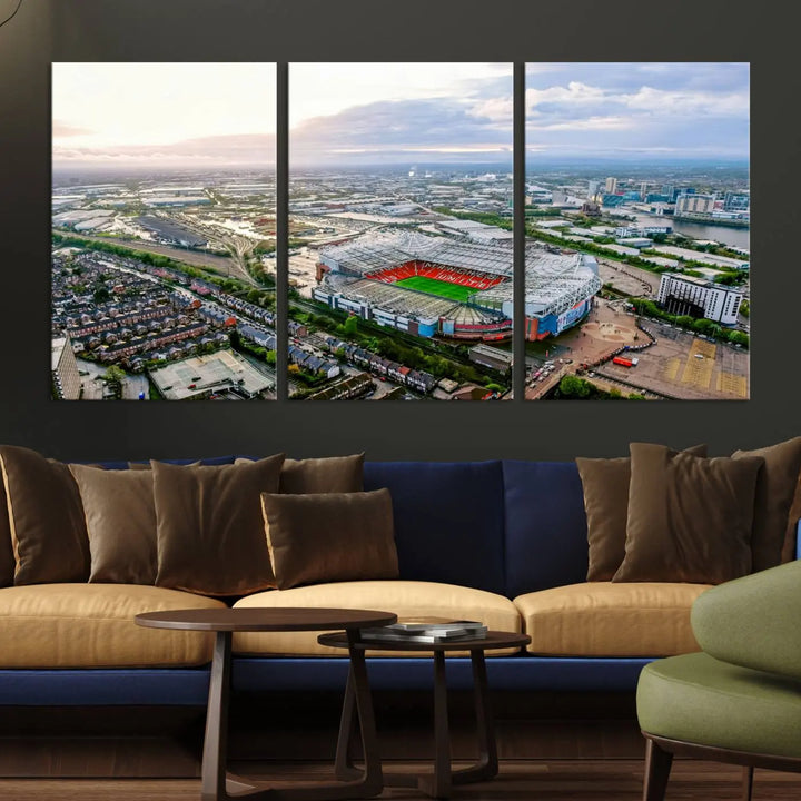 The "Old Trafford Manchester United Stadium Wall Art Canvas Print" adorns the room, showcasing an aerial view of Old Trafford at sunset. This three-panel wall art is perfect for any devoted Manchester United football fan.