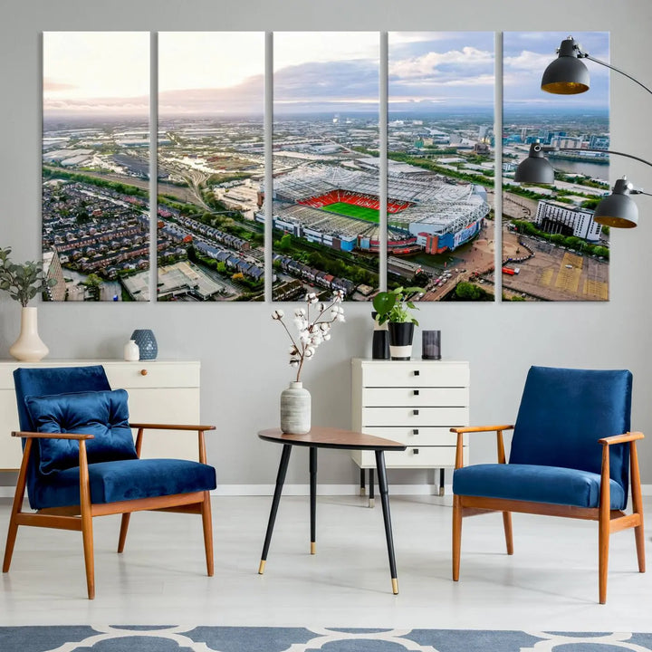 The "Old Trafford Manchester United Stadium Wall Art Canvas Print" adorns the room, showcasing an aerial view of Old Trafford at sunset. This three-panel wall art is perfect for any devoted Manchester United football fan.