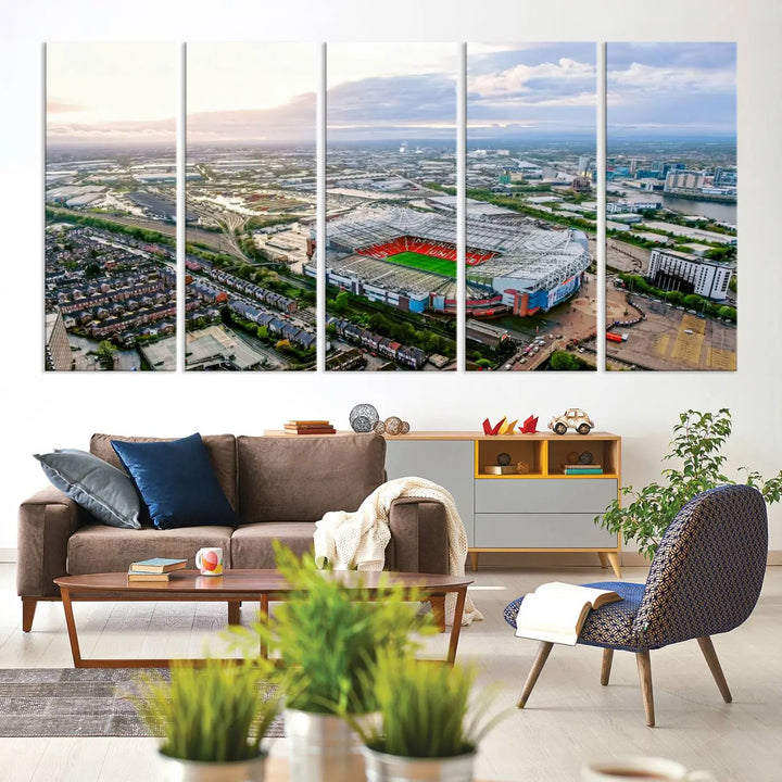 The "Old Trafford Manchester United Stadium Wall Art Canvas Print" adorns the room, showcasing an aerial view of Old Trafford at sunset. This three-panel wall art is perfect for any devoted Manchester United football fan.