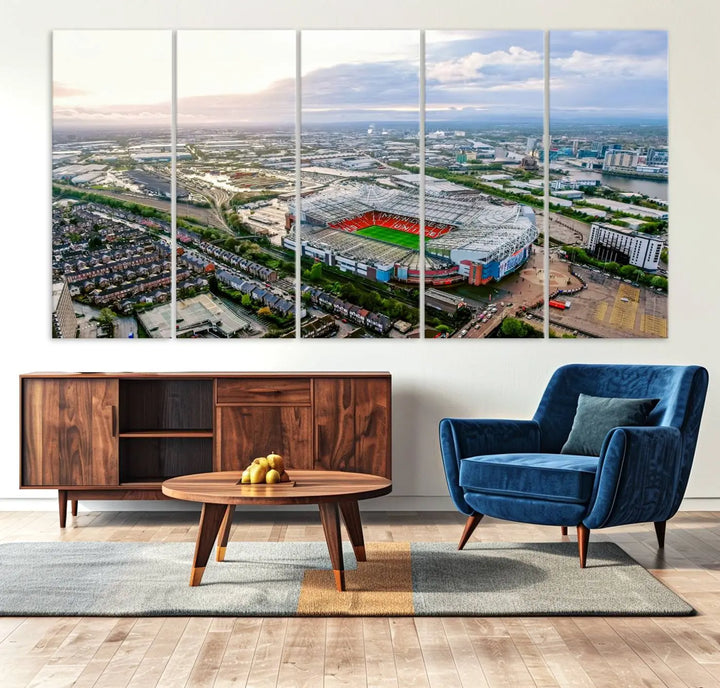 The "Old Trafford Manchester United Stadium Wall Art Canvas Print" adorns the room, showcasing an aerial view of Old Trafford at sunset. This three-panel wall art is perfect for any devoted Manchester United football fan.