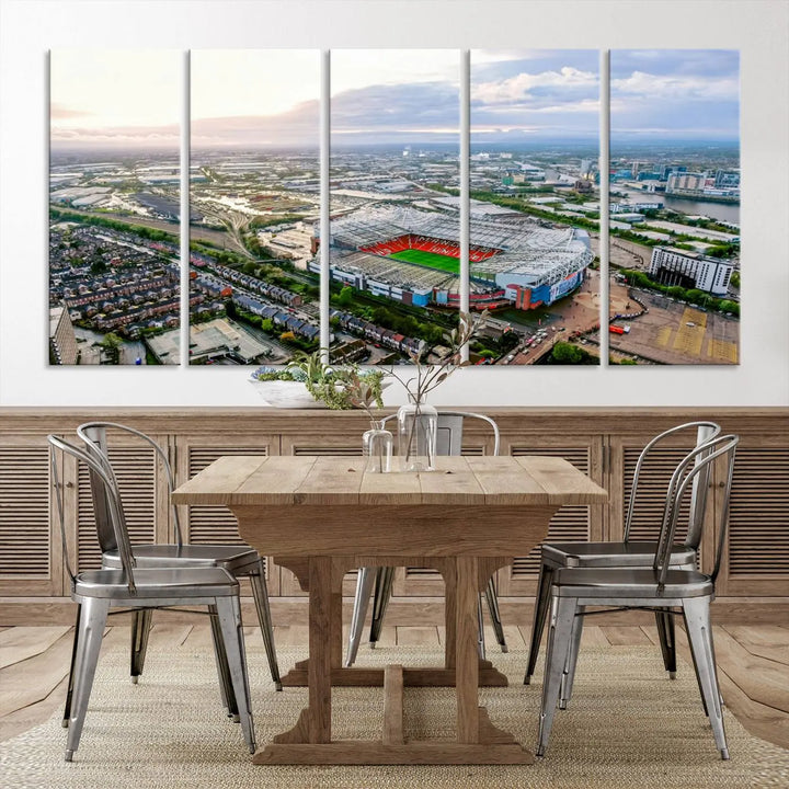 The "Old Trafford Manchester United Stadium Wall Art Canvas Print" adorns the room, showcasing an aerial view of Old Trafford at sunset. This three-panel wall art is perfect for any devoted Manchester United football fan.