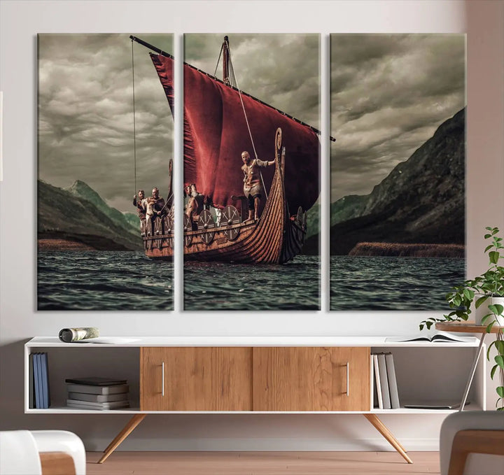 The living room features the "Old Vikings Ship Canvas Art Print Nautical Art Sailing Art Ship Wall Art," a magnificent triptych depicting a Viking ship on stormy seas, printed on museum-quality canvas. This ready-to-hang artwork enhances sophistication and longevity with its UV-protective coating.