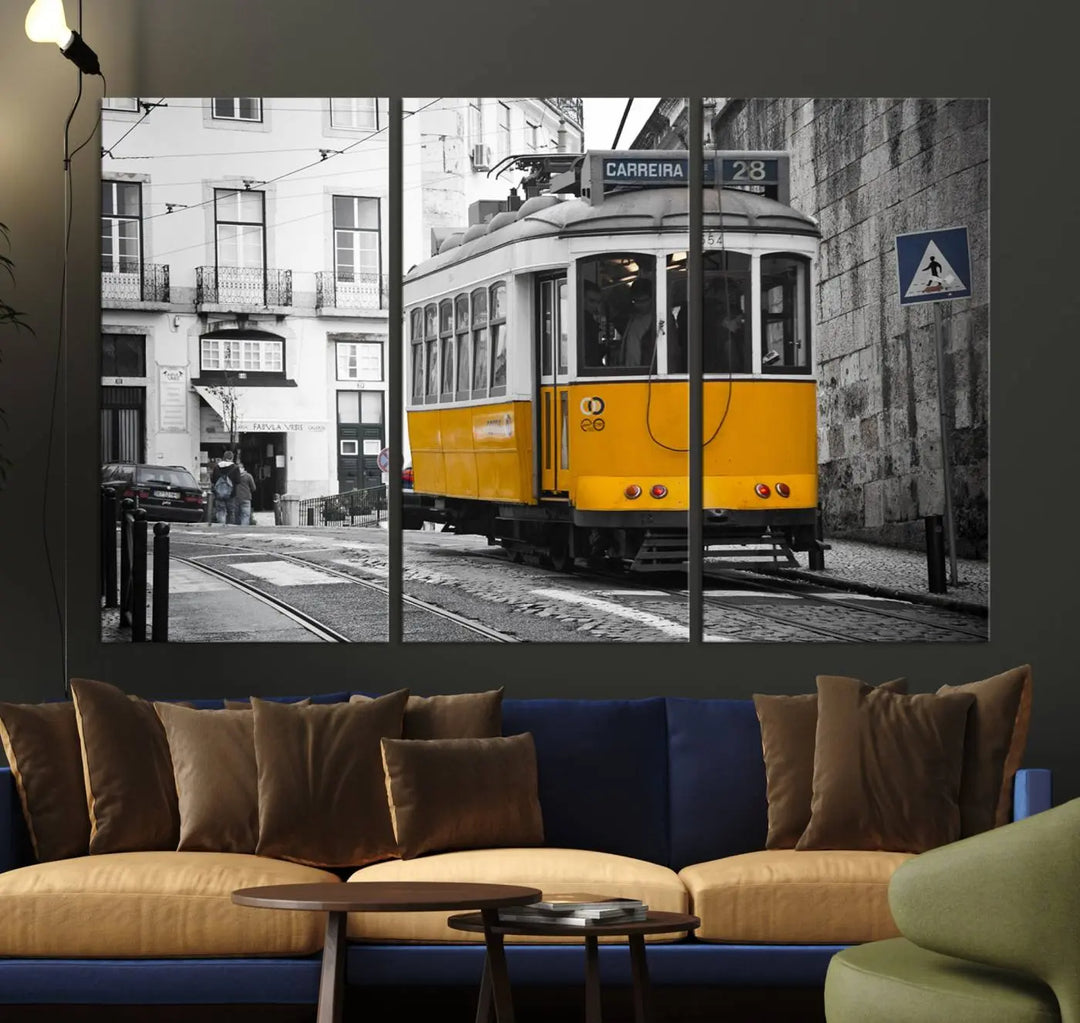 The wall art in the room features gallery-wrapped canvases with the "Old Yellow Tram Canvas Wall Art Canvas Print," which depicts a yellow tram against black-and-white city streets.