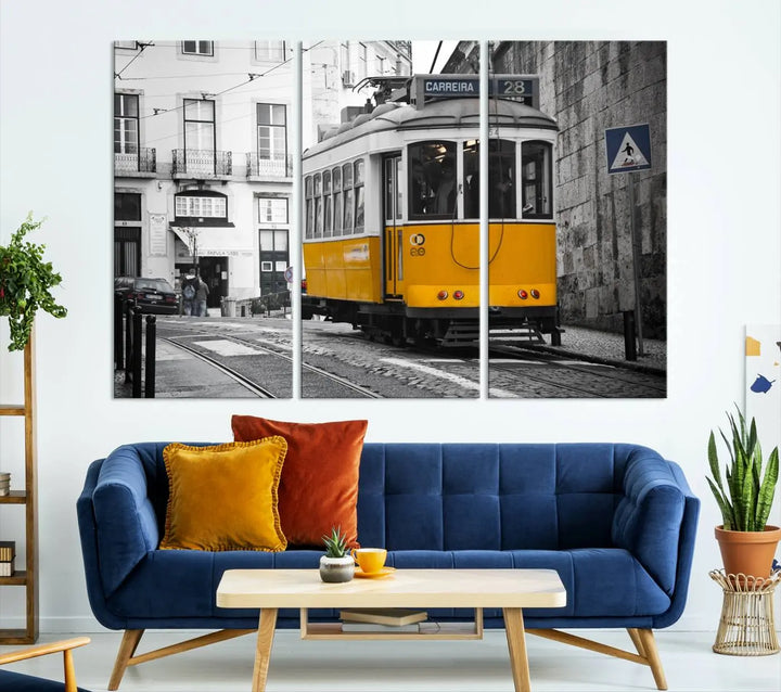 The wall art in the room features gallery-wrapped canvases with the "Old Yellow Tram Canvas Wall Art Canvas Print," which depicts a yellow tram against black-and-white city streets.