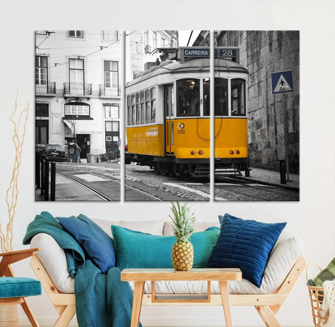 The wall art in the room features gallery-wrapped canvases with the "Old Yellow Tram Canvas Wall Art Canvas Print," which depicts a yellow tram against black-and-white city streets.