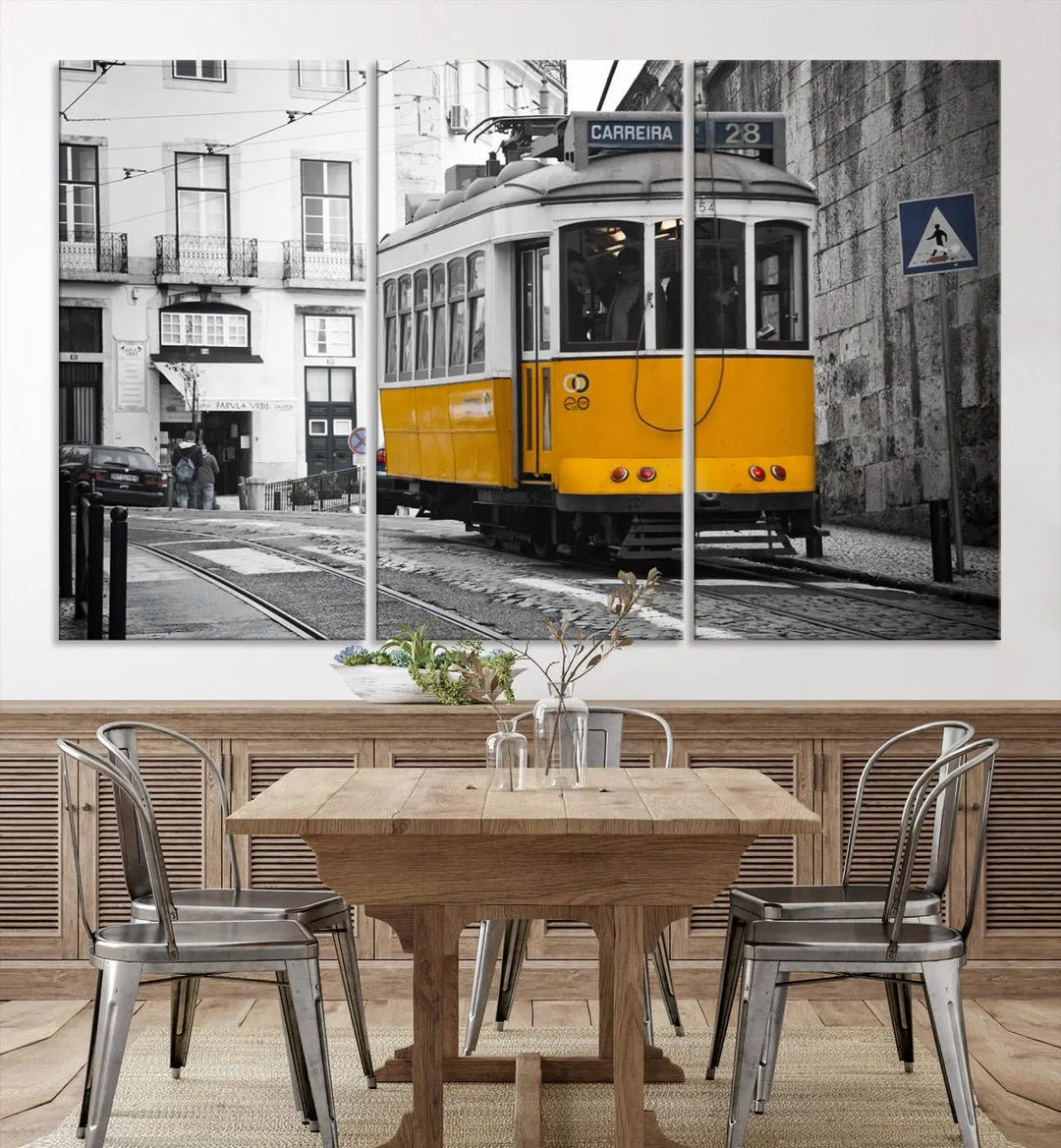 The wall art in the room features gallery-wrapped canvases with the "Old Yellow Tram Canvas Wall Art Canvas Print," which depicts a yellow tram against black-and-white city streets.