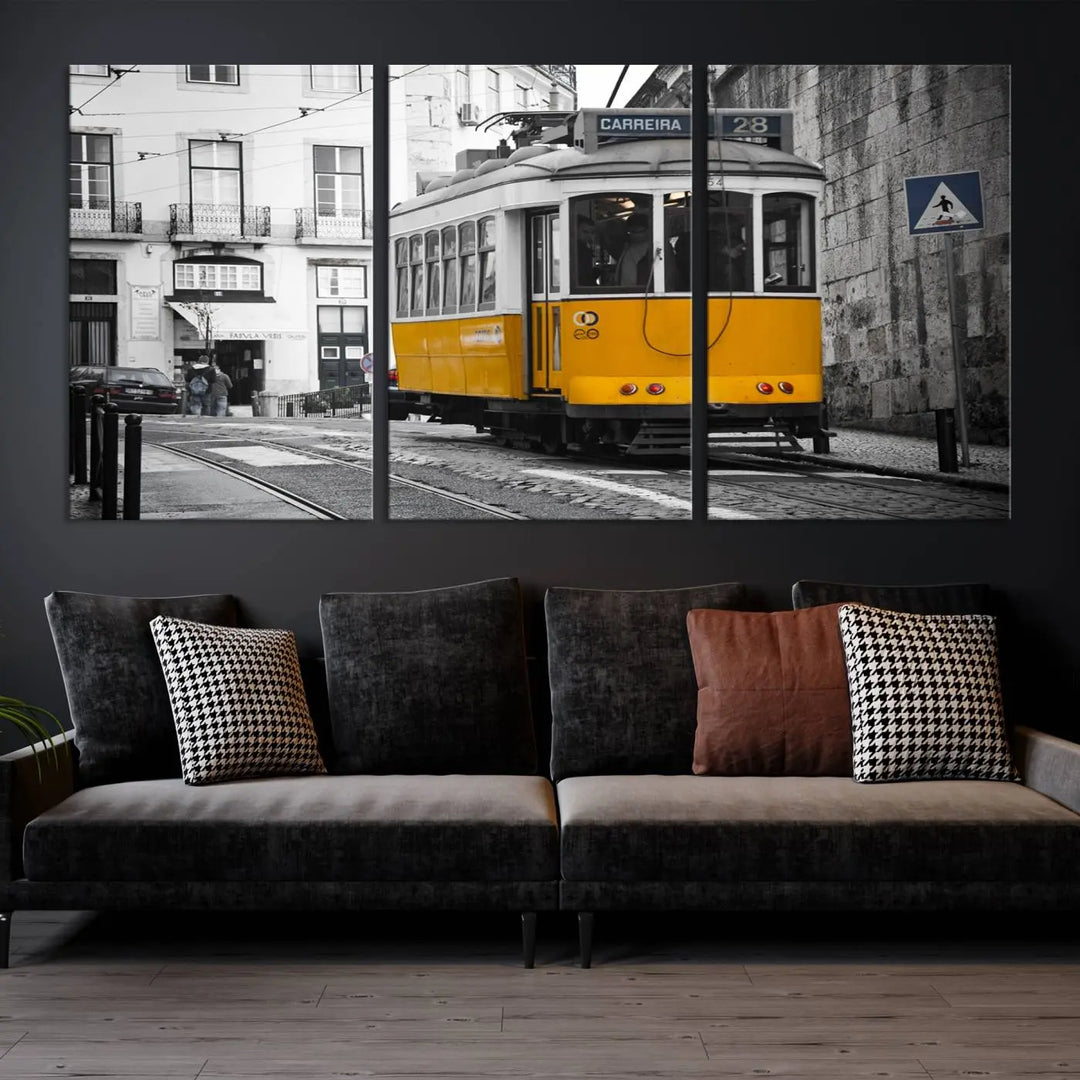 The wall art in the room features gallery-wrapped canvases with the "Old Yellow Tram Canvas Wall Art Canvas Print," which depicts a yellow tram against black-and-white city streets.