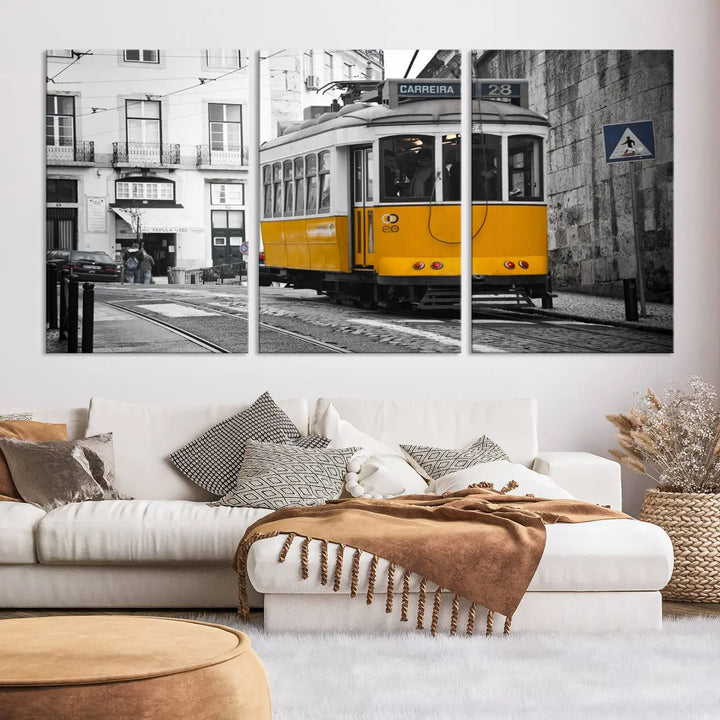 The wall art in the room features gallery-wrapped canvases with the "Old Yellow Tram Canvas Wall Art Canvas Print," which depicts a yellow tram against black-and-white city streets.