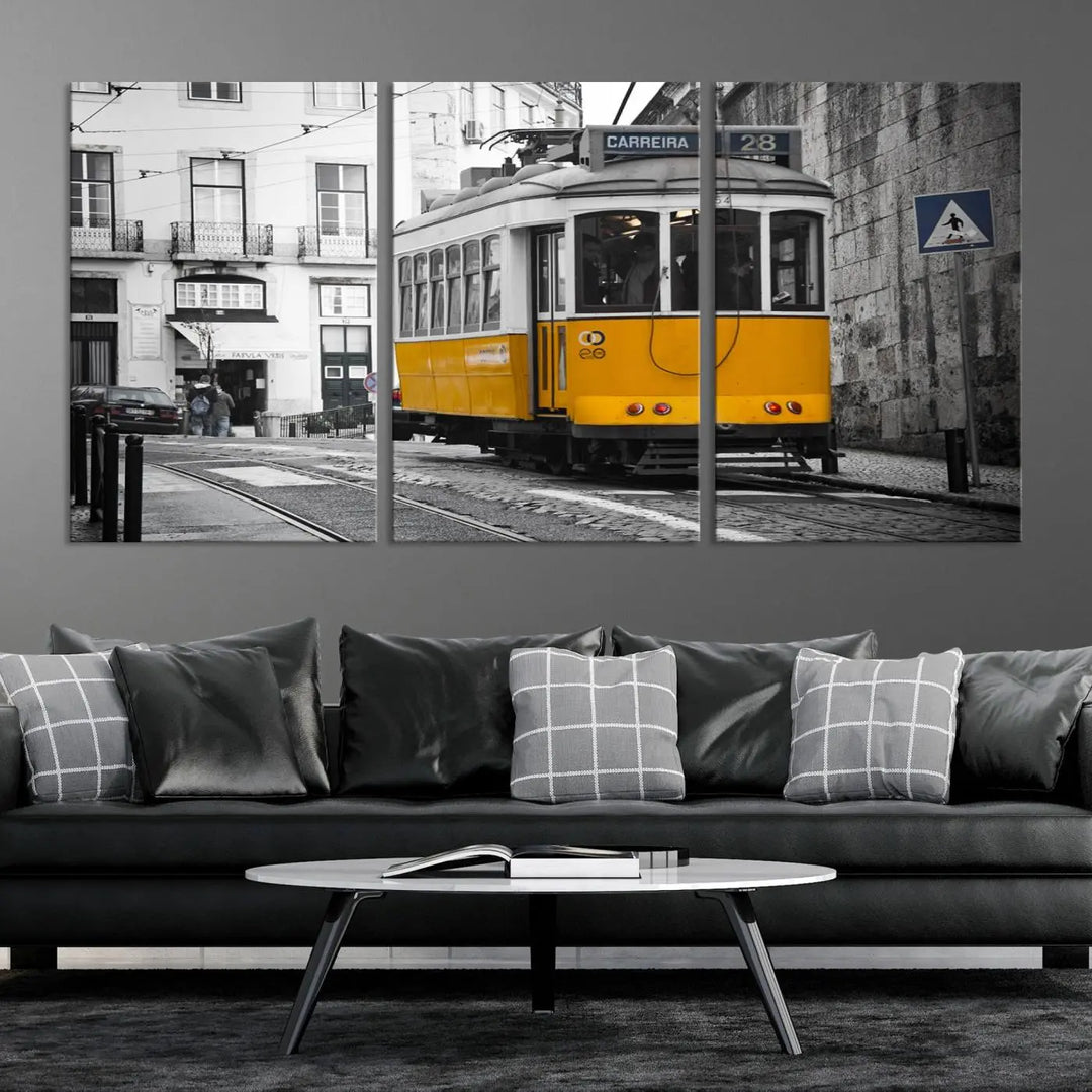 The wall art in the room features gallery-wrapped canvases with the "Old Yellow Tram Canvas Wall Art Canvas Print," which depicts a yellow tram against black-and-white city streets.